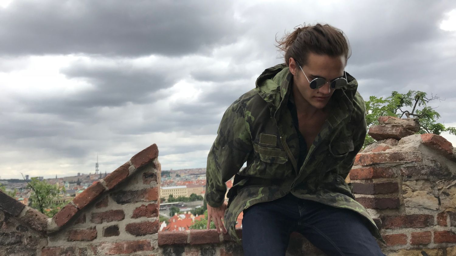 A student, Daniel, jumping of a castle wall