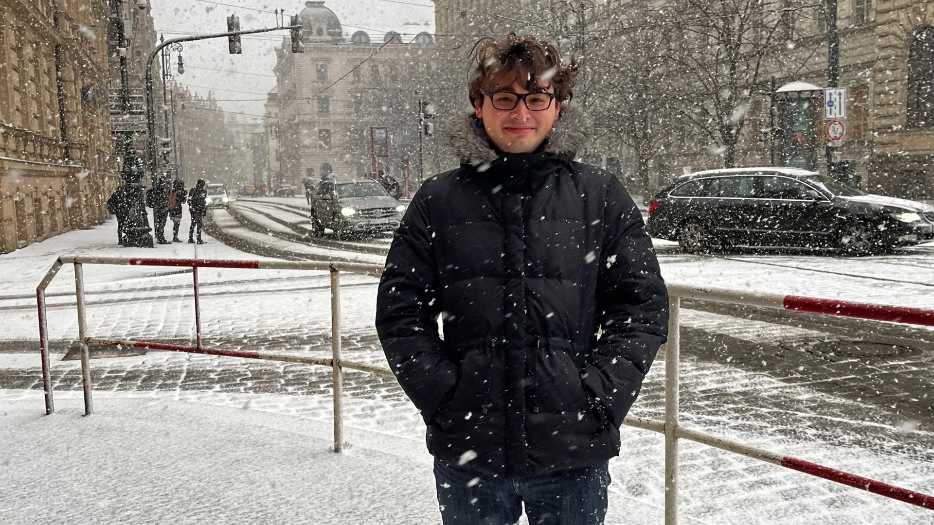 Colton Williams in the streets of Prague while snowing